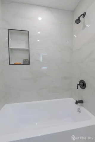 a bathroom with a bathtub