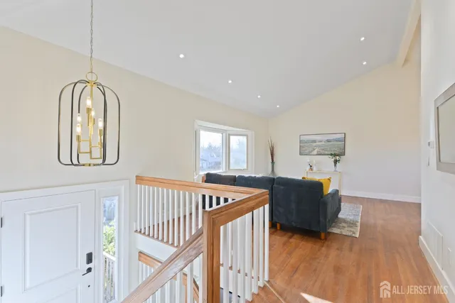 a view of livingroom with furniture and wooden floor
