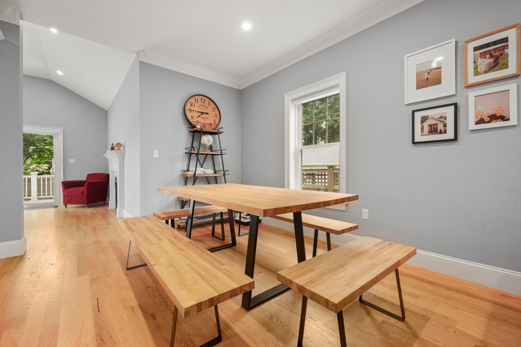 26 Brookfield Road Waltham, MA 02452 - Photo 17 of 37 a view of a dining room with furniture and chandelier