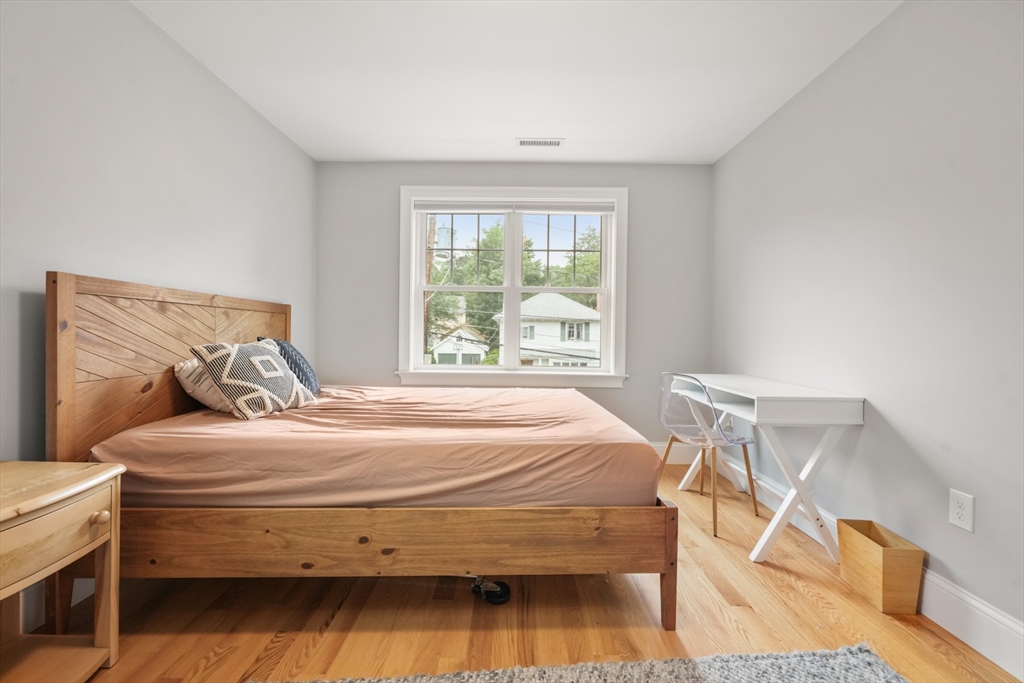 26 Brookfield Road Waltham, MA 02452 - Photo 28 of 37 a bedroom with a bed and a window