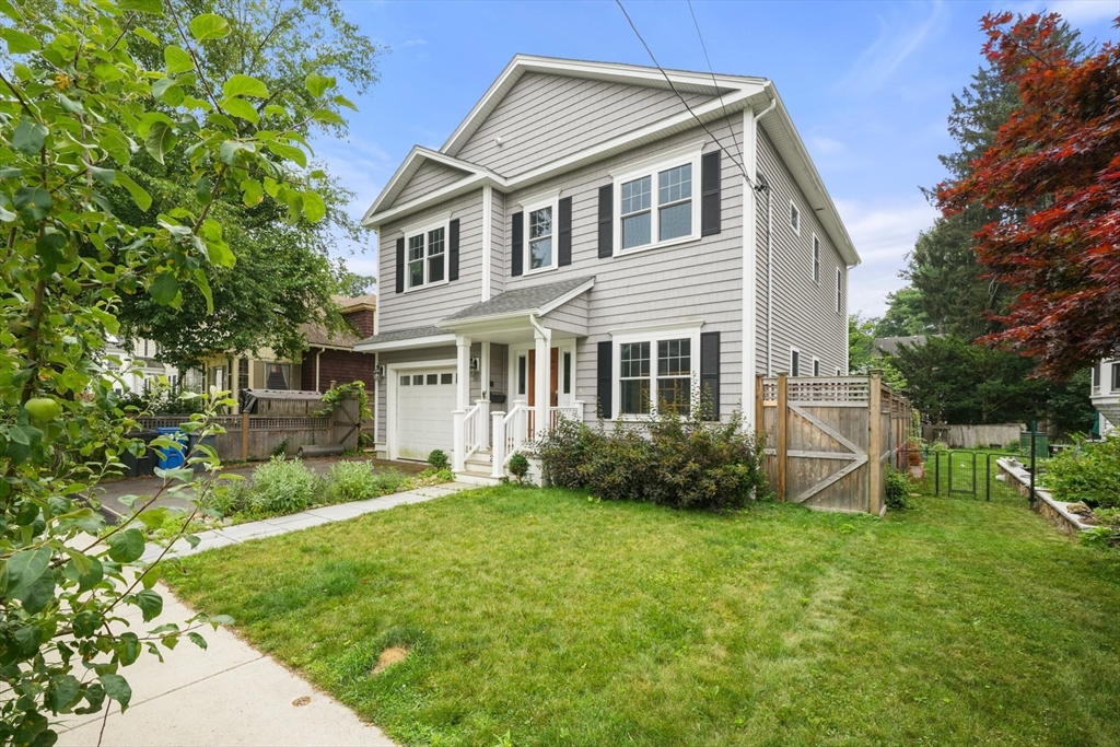 26 Brookfield Road Waltham, MA 02452 - Photo 3 of 37 a front view of a house with garden