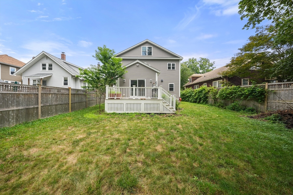 26 Brookfield Road Waltham, MA 02452 - Photo 36 of 37 a front view of a house with a yard