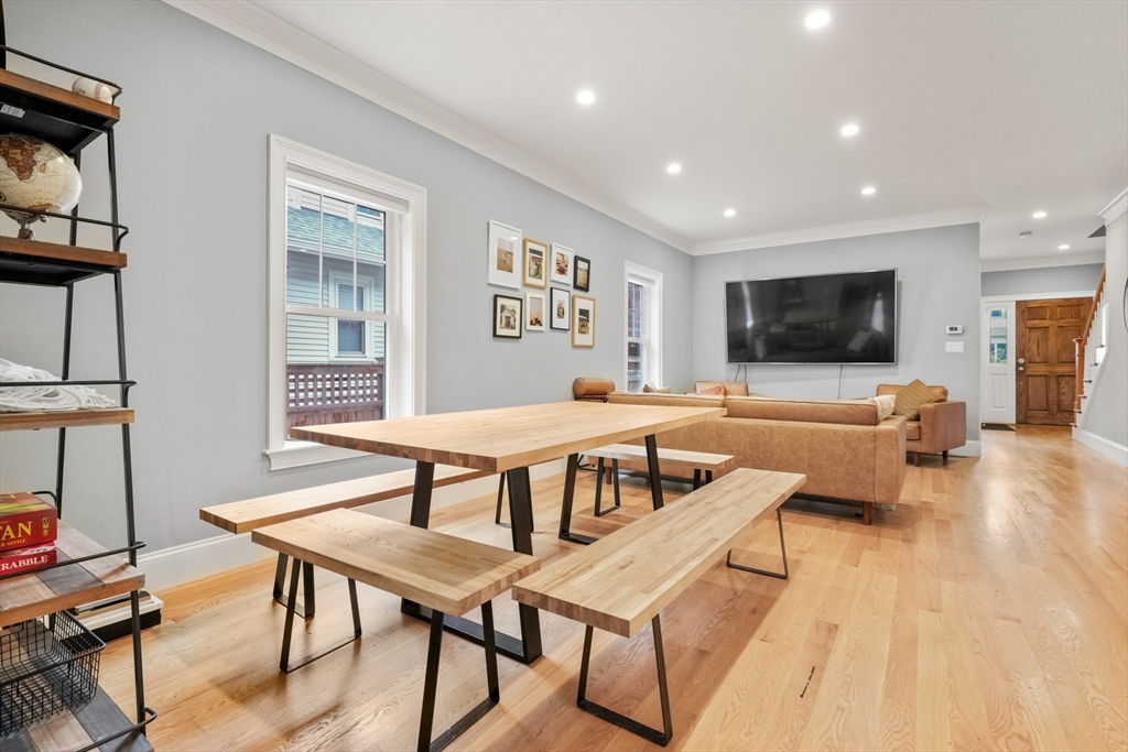 26 Brookfield Road Waltham, MA 02452 - Photo 7 of 37 a living room with furniture and a flat screen tv