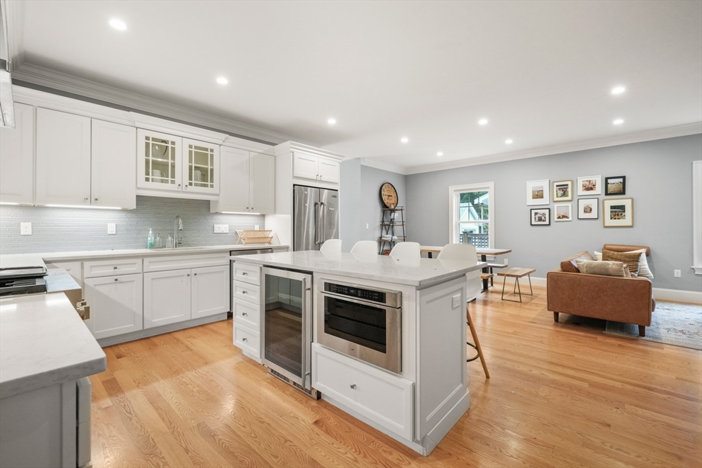 26 Brookfield Road Waltham, MA 02452 - Photo 9 of 37 a kitchen with a sink stove and cabinets