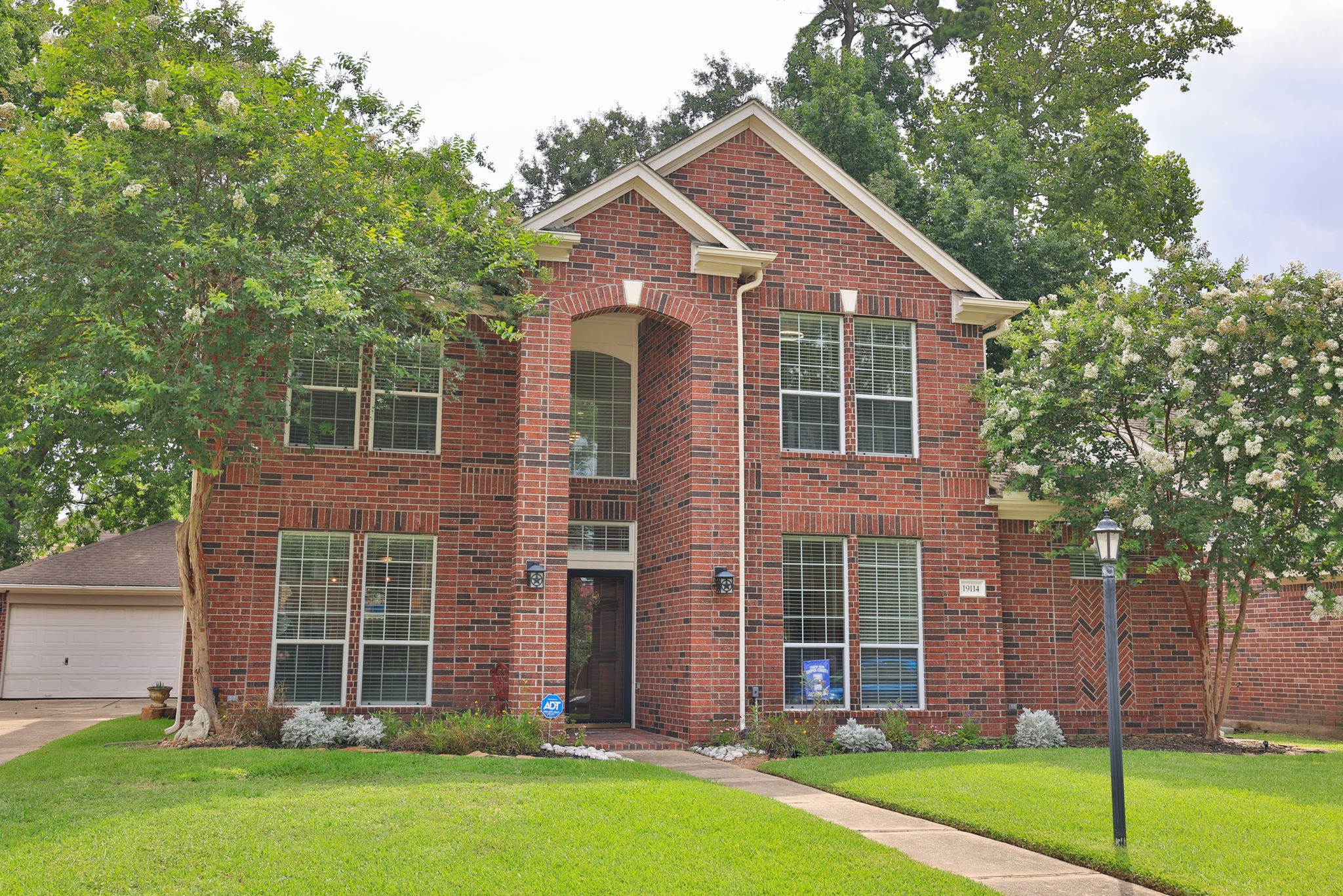 19114 Emory Trail Spring, TX 77388 - Photo 1 of 44 front view of a house with a yard
