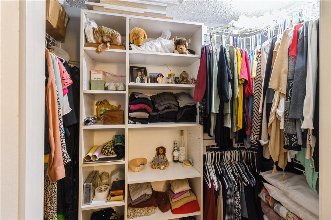26 Cornhill Place Rochester, NY 14608 - Photo 19 of 24 Walk in Closet in Primary Bedroom