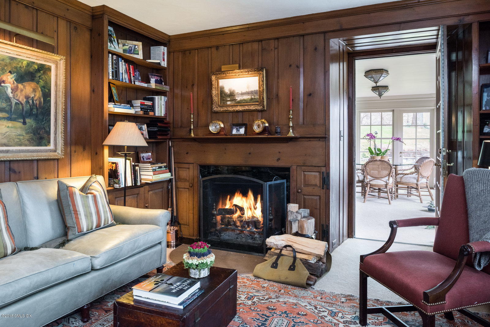 32 Pecksland Road Greenwich, CT 06831 - Photo 8 of 24 a living room with furniture and a fireplace