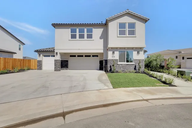 a house view with a outdoor space