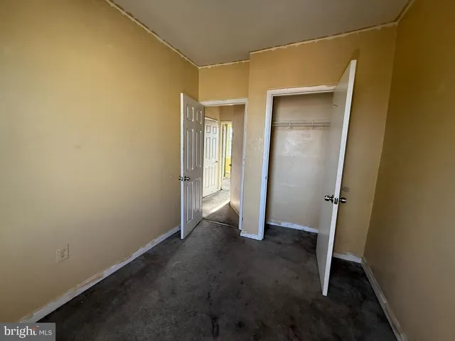 an empty room with closet