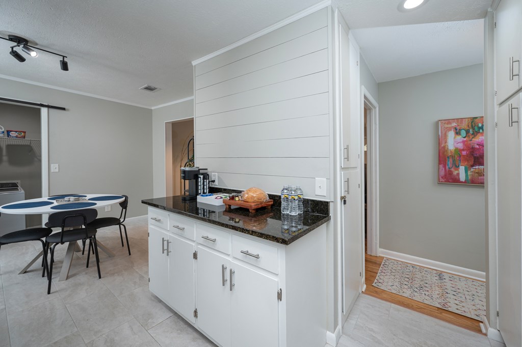 3828 Reese Road Columbus, GA 31907 - Photo 20 of 45 a kitchen with stainless steel appliances granite countertop a sink and a cabinets