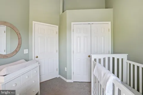 a view of a room with baby furniture