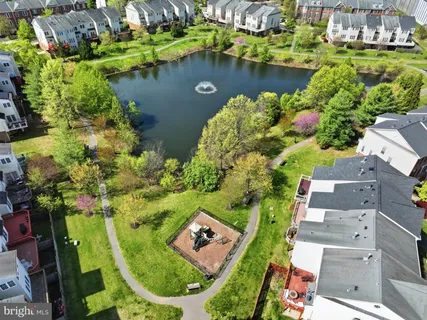aerial view of a house with a lake view