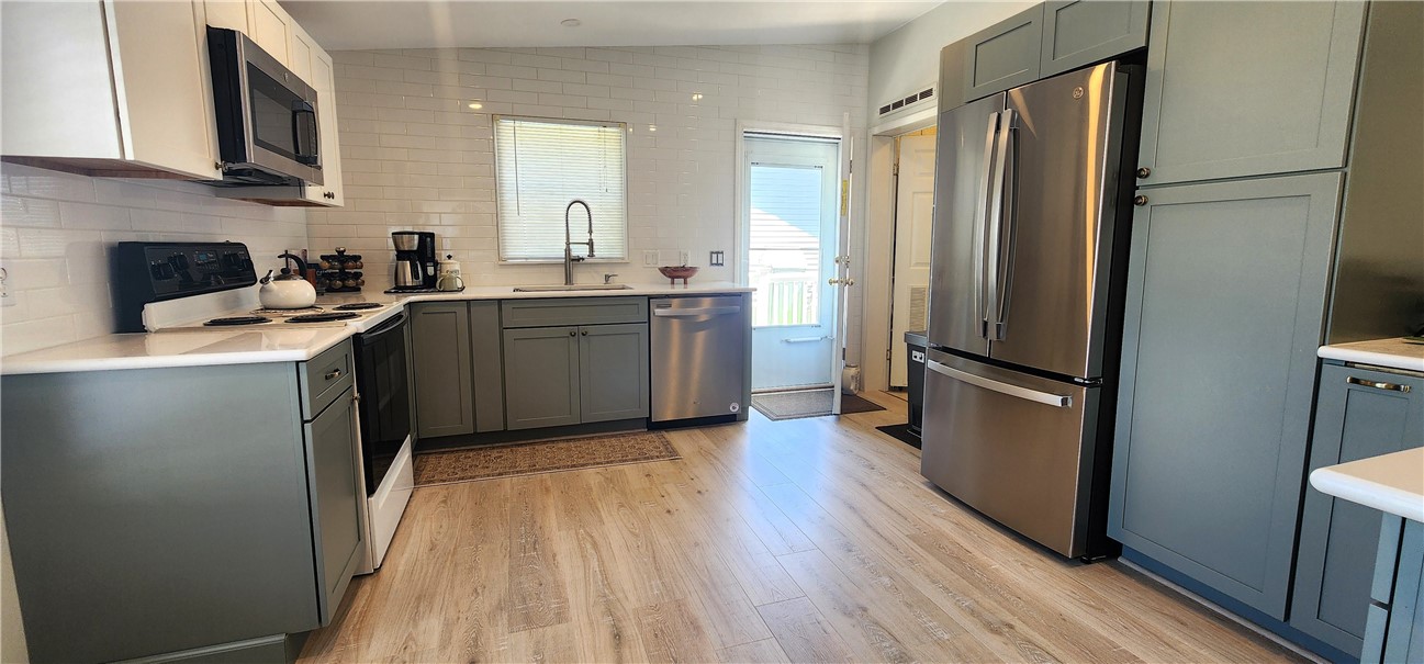 76 Robin Drive Tiverton, RI 02878 - Photo 3 of 30 stainless with quartz counters