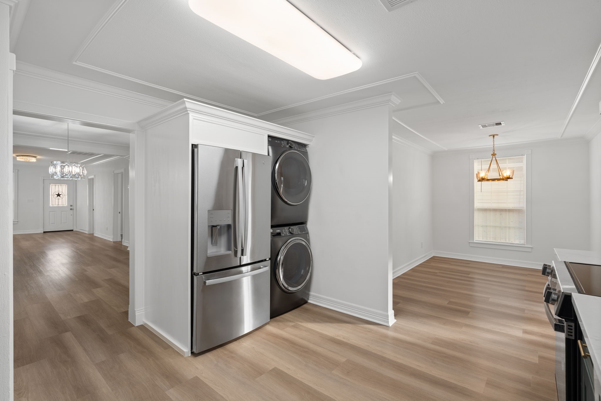 203 Archer Street Houston, TX 77009 - Photo 14 of 43 a view of kitchen with refrigerator and wooden floor