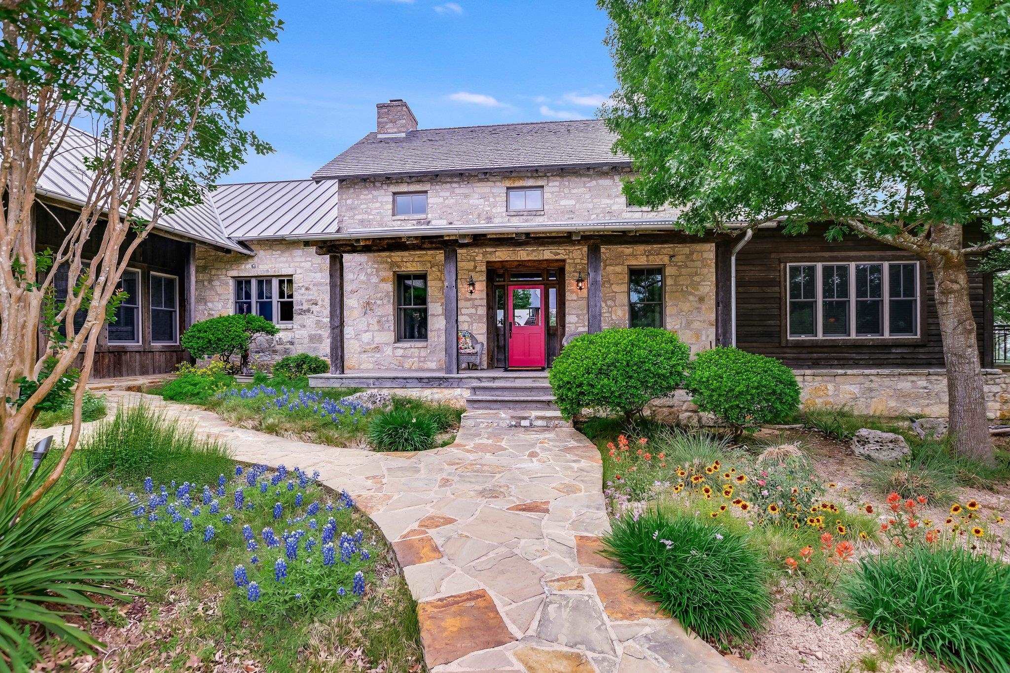 170 Sandstone Ridge Drive Marble Falls, TX 78654 - Photo 1 of 38 front view of a house with a yard