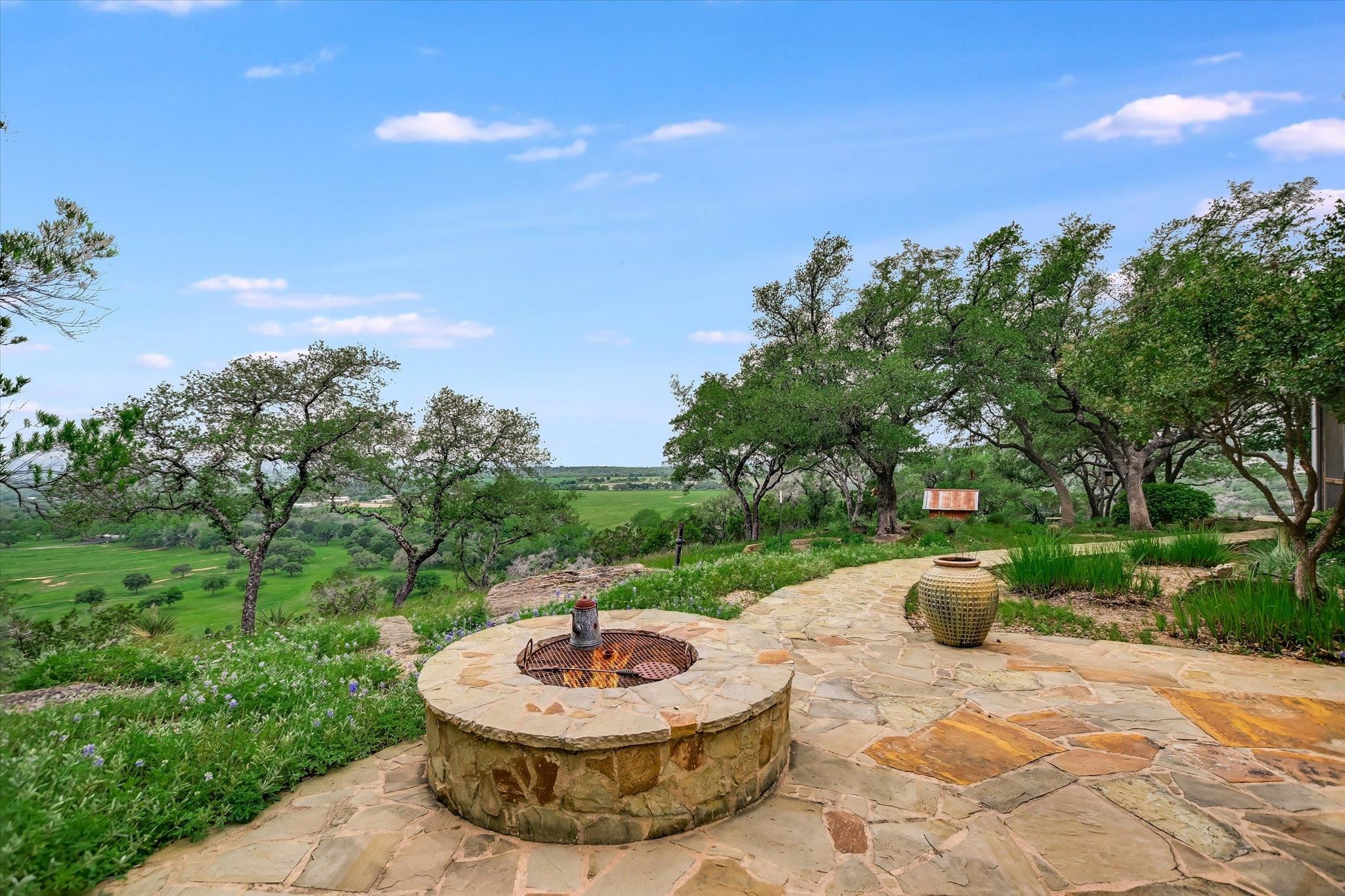 170 Sandstone Ridge Drive Marble Falls, TX 78654 - Photo 13 of 38 a view of a backyard of the house