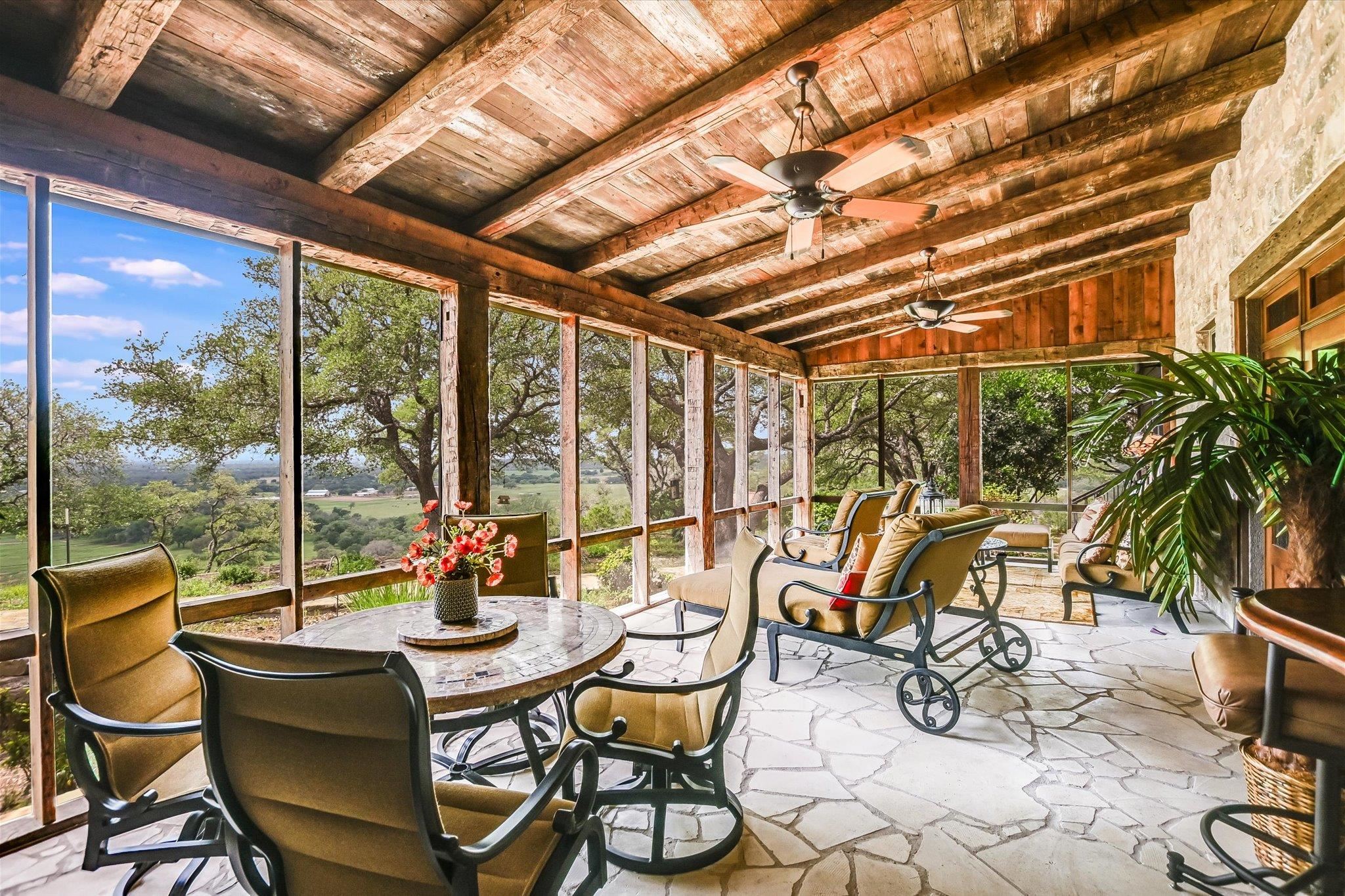 170 Sandstone Ridge Drive Marble Falls, TX 78654 - Photo 19 of 38 a view of a chairs and table in the patio