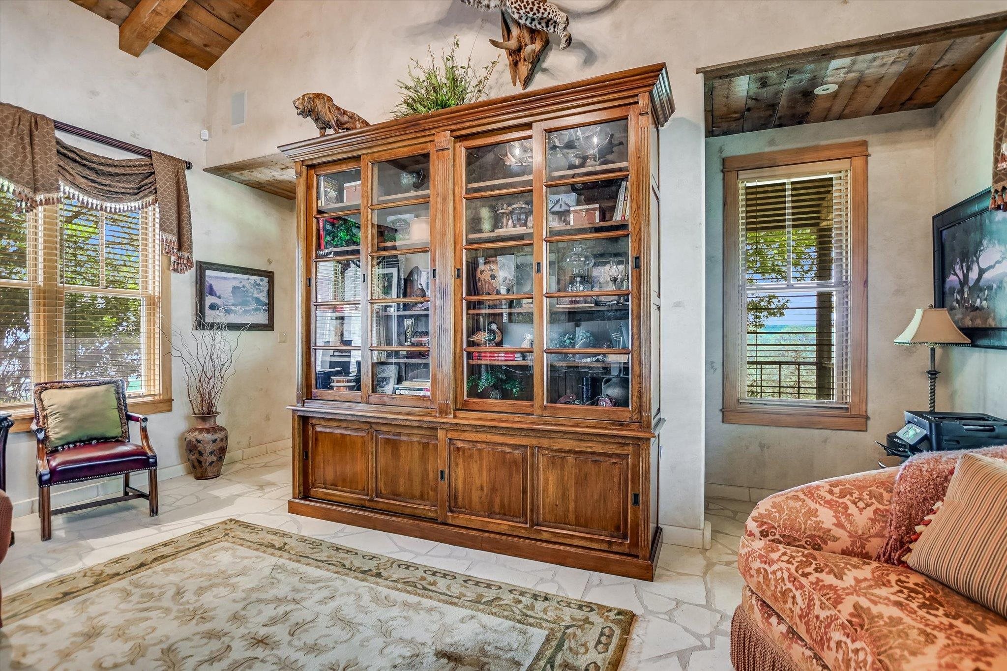 170 Sandstone Ridge Drive Marble Falls, TX 78654 - Photo 23 of 38 a living room with furniture cabinets and a window