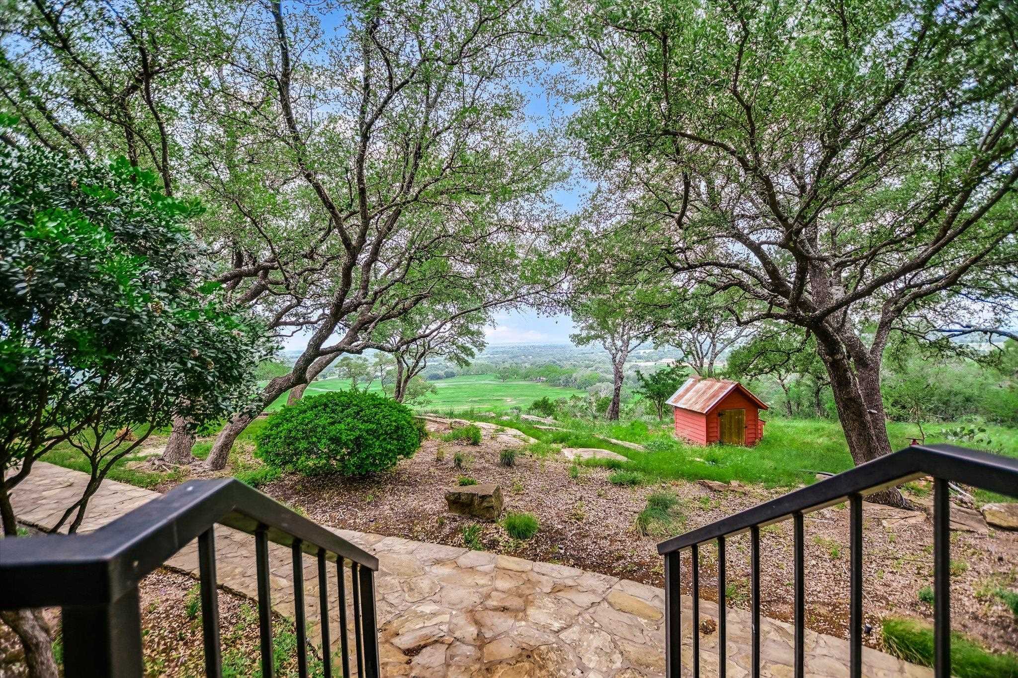170 Sandstone Ridge Drive Marble Falls, TX 78654 - Photo 24 of 38 a view of a street from a balcony