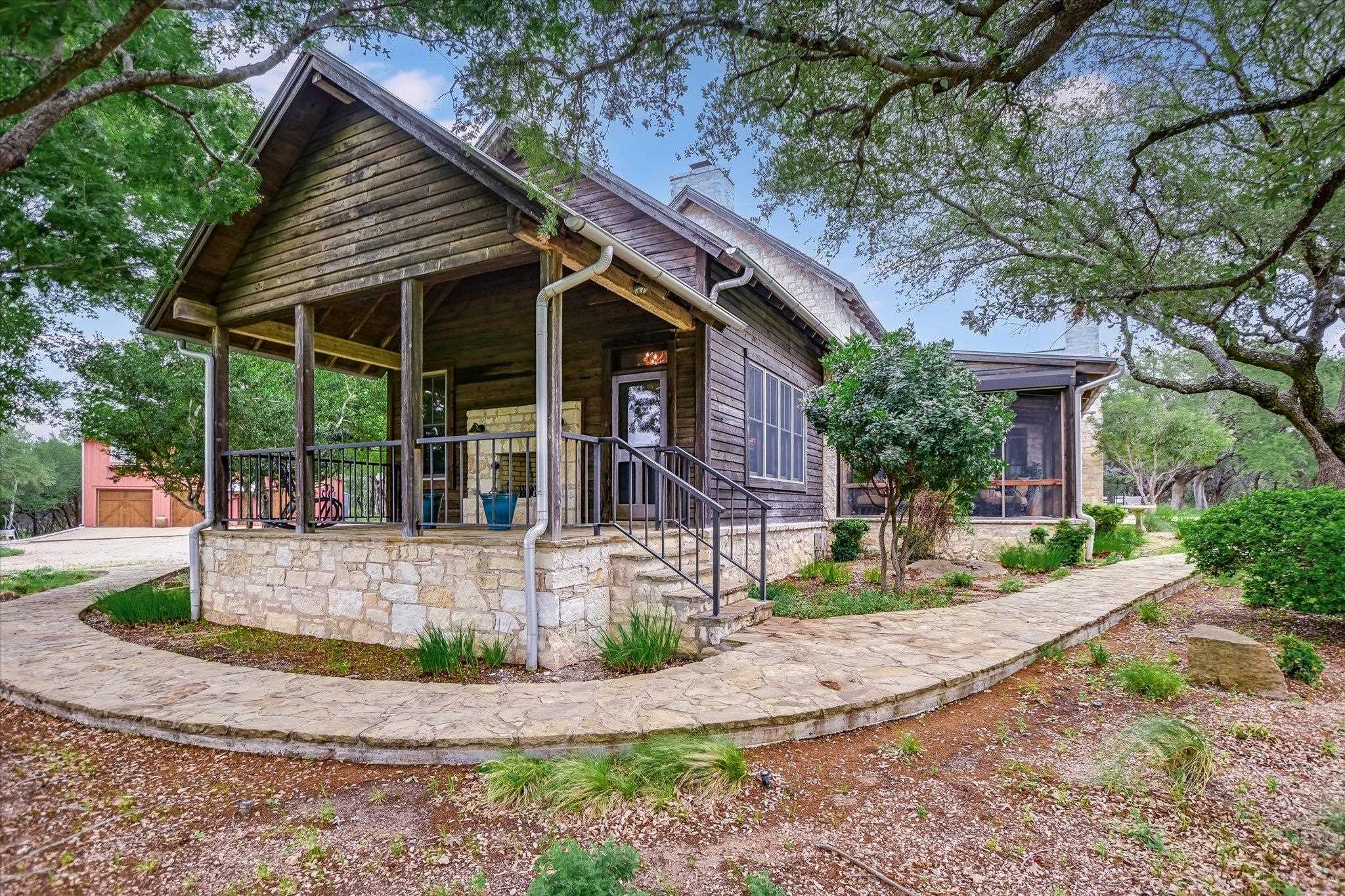 170 Sandstone Ridge Drive Marble Falls, TX 78654 - Photo 25 of 38 front view of house with a yard
