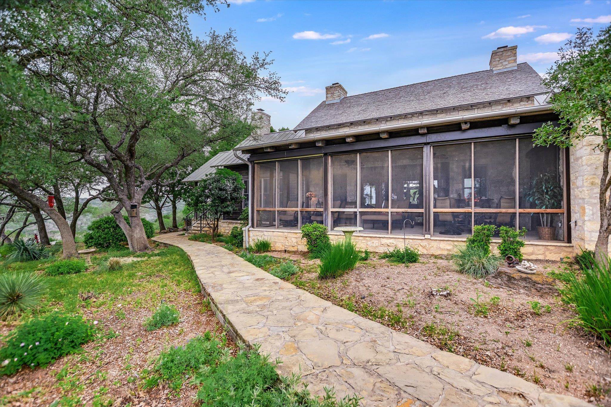 170 Sandstone Ridge Drive Marble Falls, TX 78654 - Photo 26 of 38 a house view with a garden space