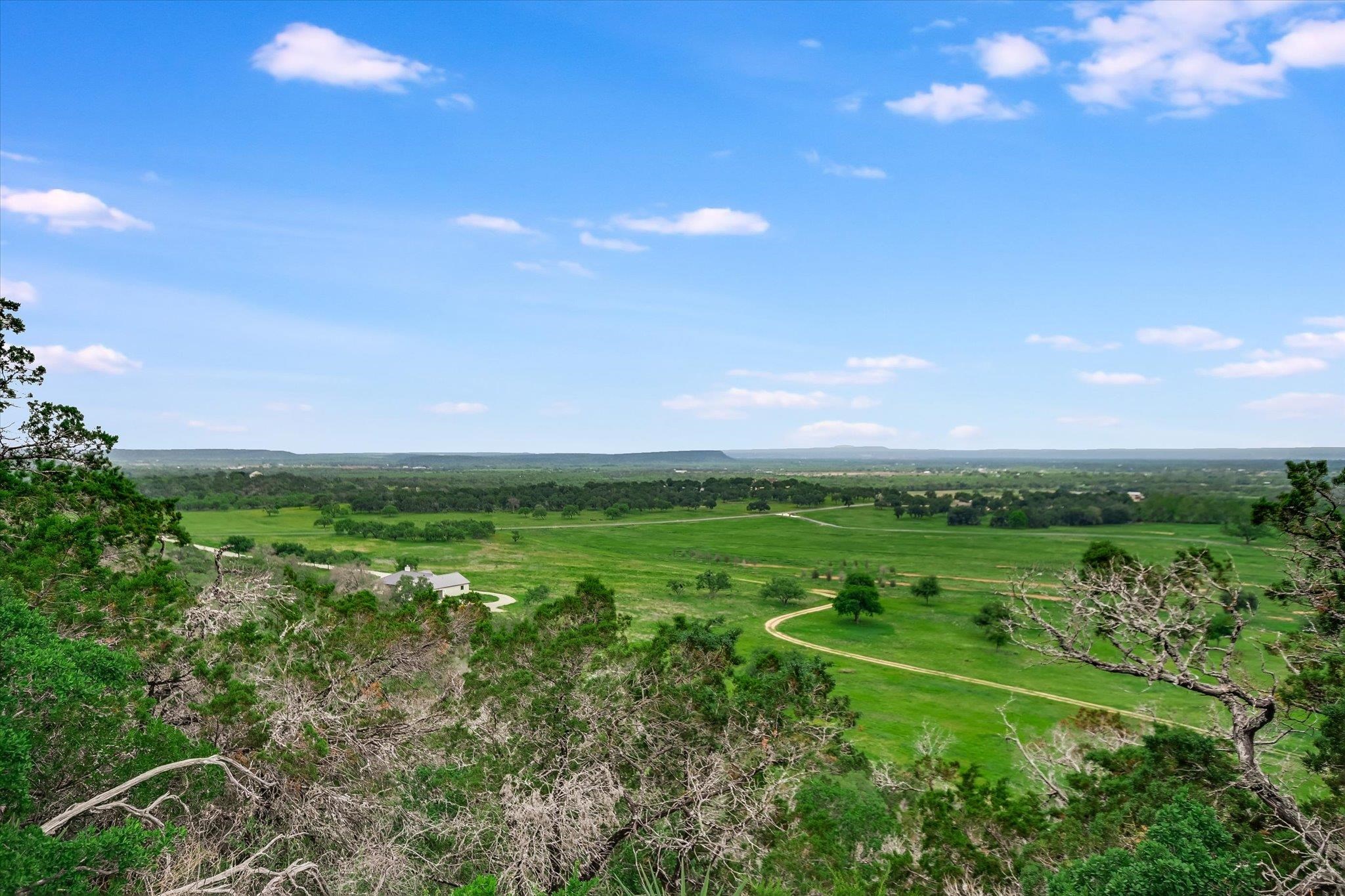 170 Sandstone Ridge Drive Marble Falls, TX 78654 - Photo 36 of 38 a view of a city with lush green forest