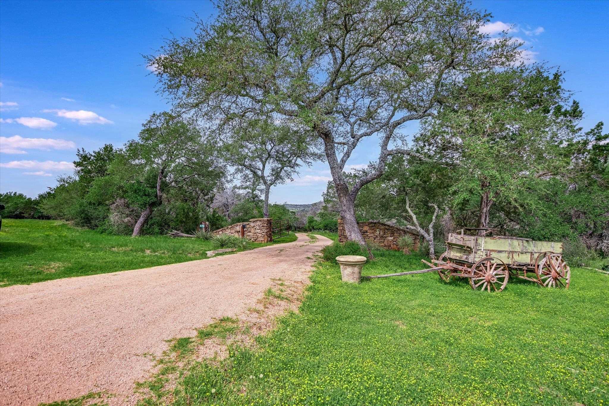 170 Sandstone Ridge Drive Marble Falls, TX 78654 - Photo 38 of 38 a view of a backyard with sitting area