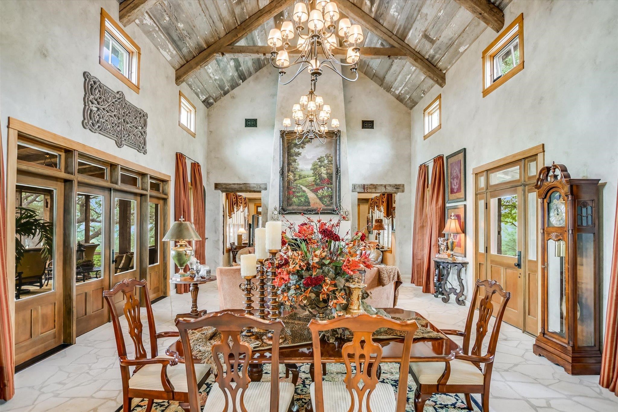 170 Sandstone Ridge Drive Marble Falls, TX 78654 - Photo 7 of 38 a view of a dining room with furniture and chandelier