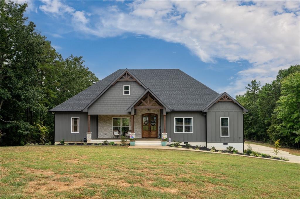 95 County Road 1016 Cedar Bluff, AL 35959 - Photo 1 of 1 a front view of a house with swimming pool having outdoor seating