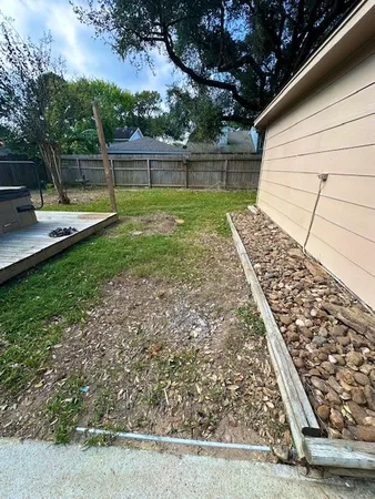 a view of swimming pool with a patio