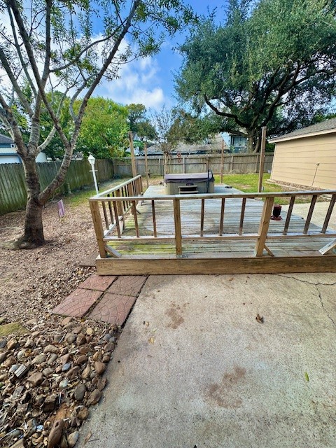 17719 Cassina Drive Spring, TX 77388 - Photo 18 of 19 a view of a wooden deck and a yard