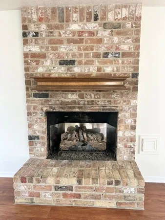 a living room with a fireplace