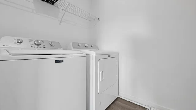 a utility room with dryer and washer
