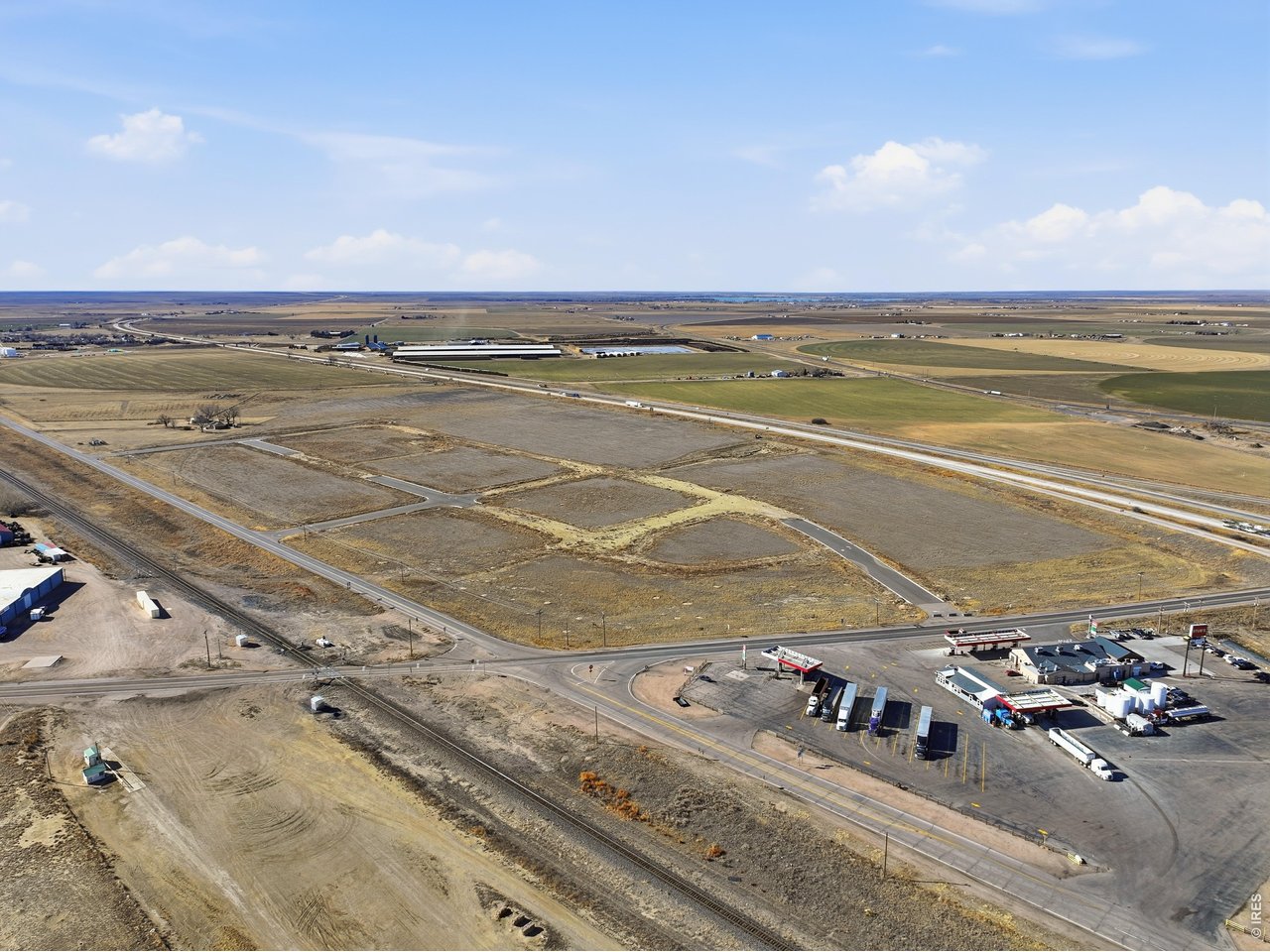 4 Tract Wiggins, CO 80654 - Photo 5 of 11 a view of an ocean and city