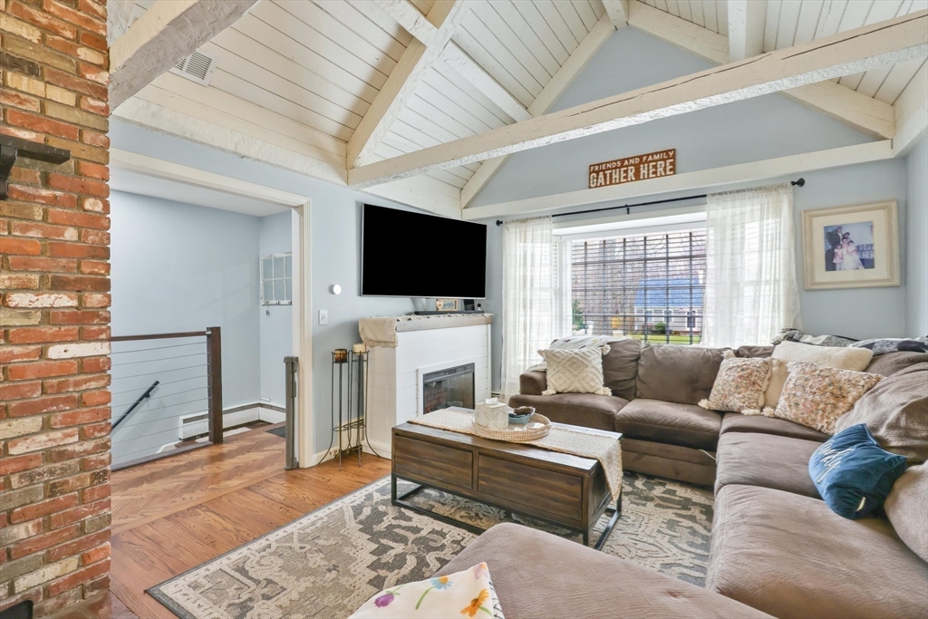 17 Glen Drive Wilbraham, MA 01095 - Photo 12 of 42 a living room with furniture and a flat screen tv