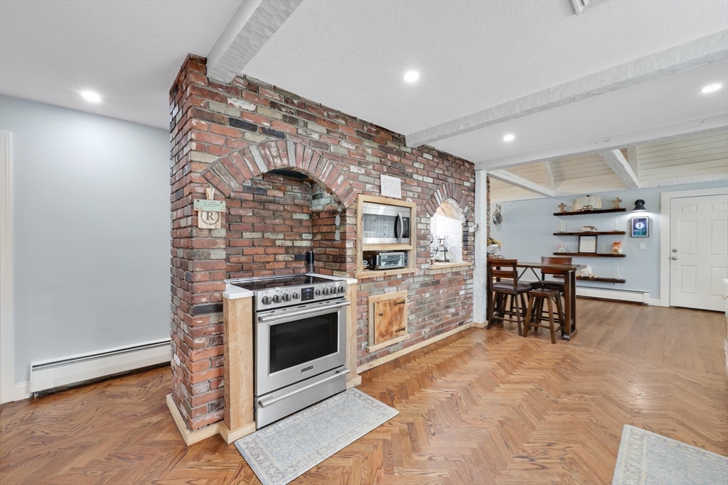 17 Glen Drive Wilbraham, MA 01095 - Photo 14 of 42 a kitchen with a stove and a refrigerator