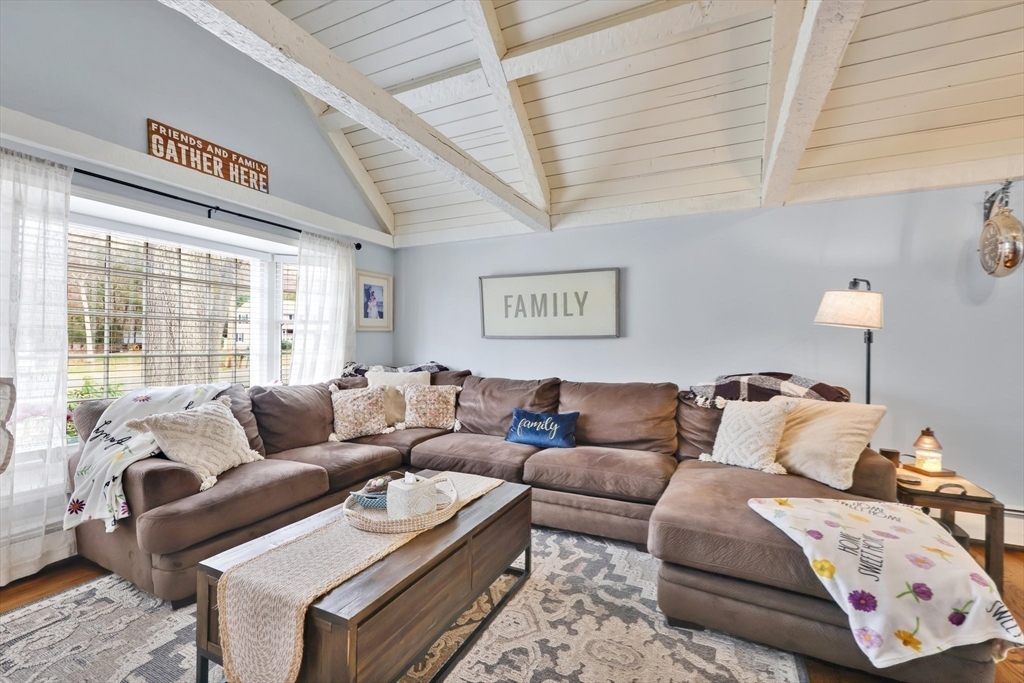 17 Glen Drive Wilbraham, MA 01095 - Photo 15 of 42 a living room with furniture and a large window