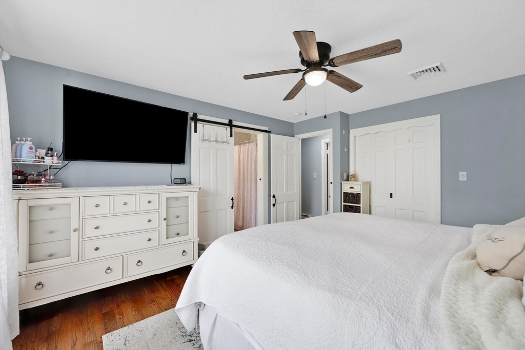 17 Glen Drive Wilbraham, MA 01095 - Photo 21 of 42 a bedroom with a bed and a flat screen tv