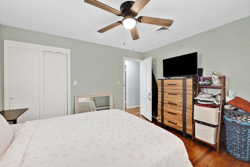 17 Glen Drive Wilbraham, MA 01095 - Photo 22 of 42 a bedroom with a bed and a flat screen tv