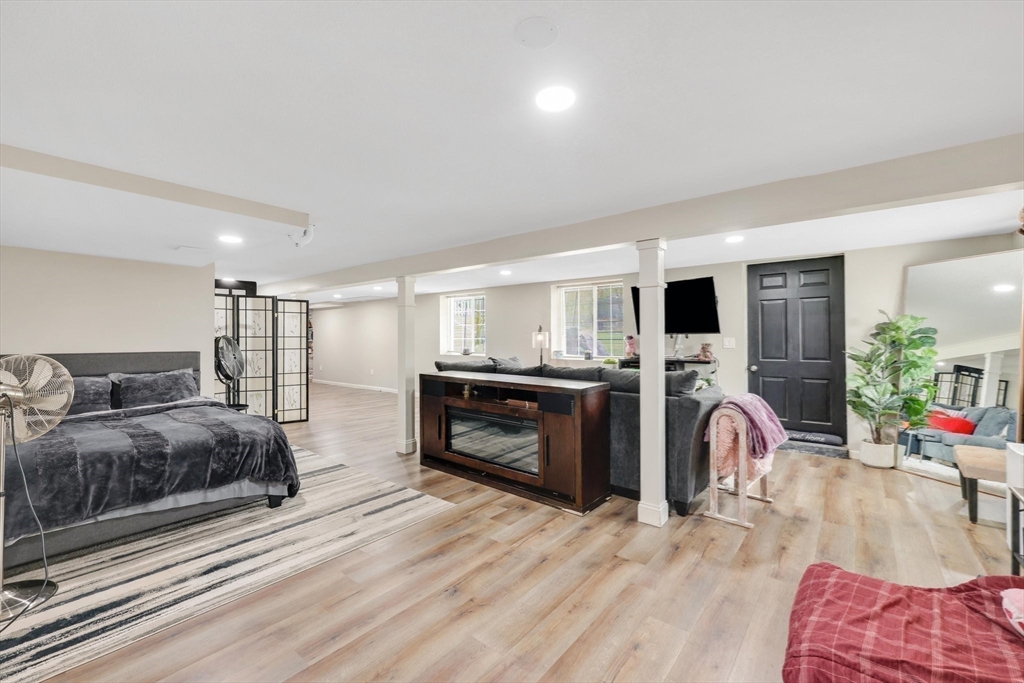 17 Glen Drive Wilbraham, MA 01095 - Photo 29 of 42 a bedroom with furniture and a flat screen tv