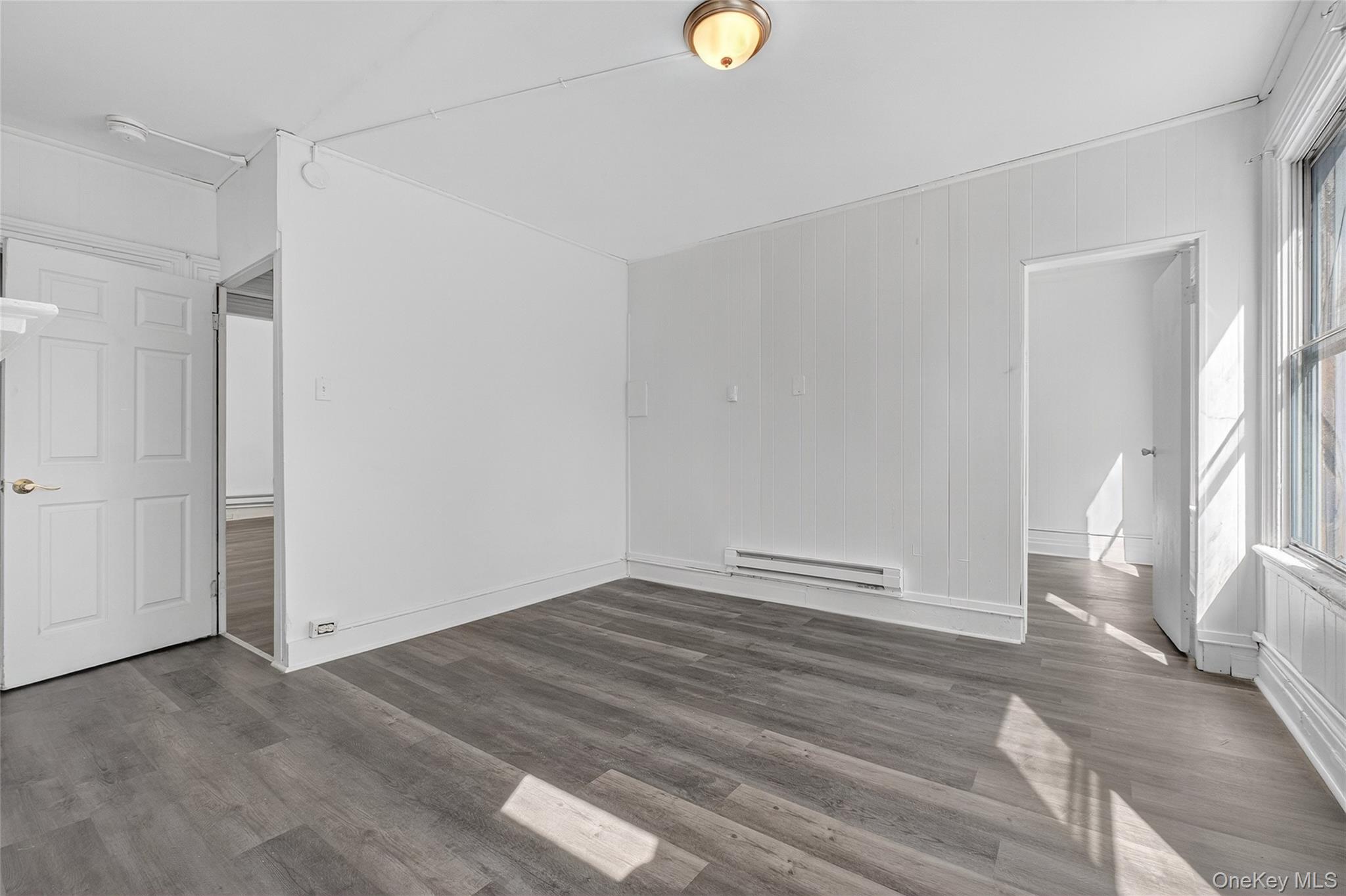 49 South Hamilton Street, Unit 2 Poughkeepsie, NY 12601 - Photo 11 of 27 a view of empty room with wooden floor