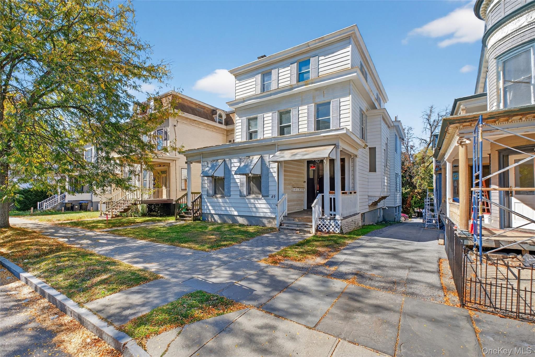 49 South Hamilton Street, Unit 2 Poughkeepsie, NY 12601 - Photo 2 of 27 a view of a house with a yard