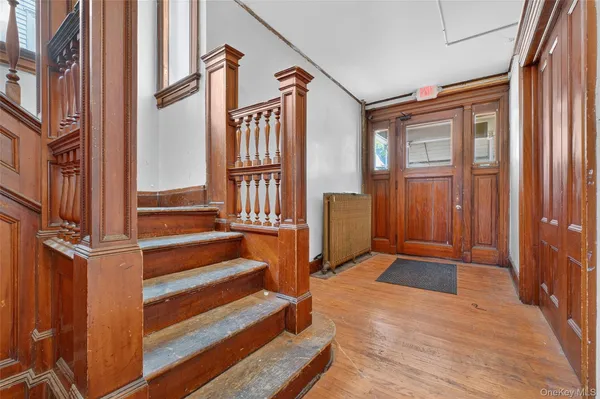 a view of an entryway with staircase