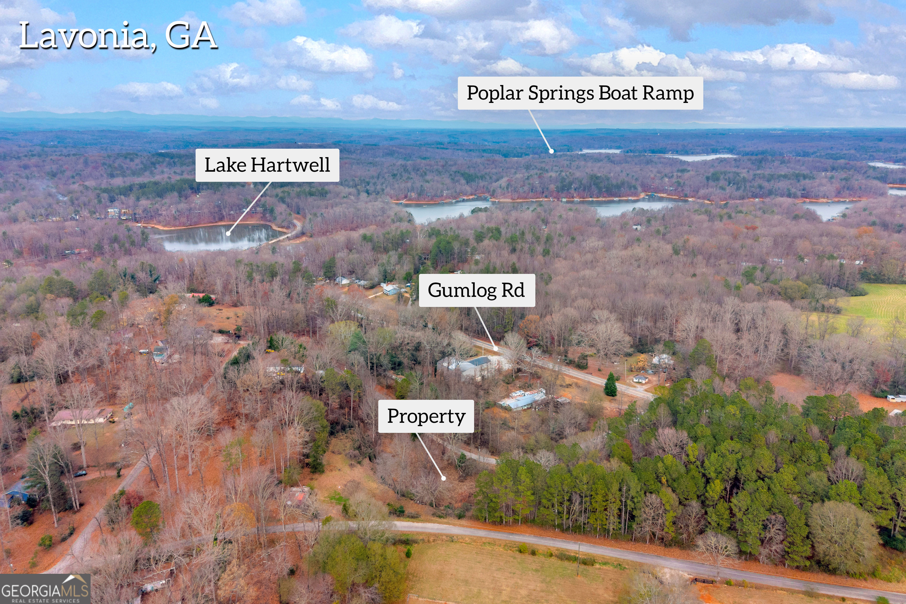 510 Gumlog Grove Road Lavonia, GA 30553 - Photo 13 of 22 a sign that is on a brick wall