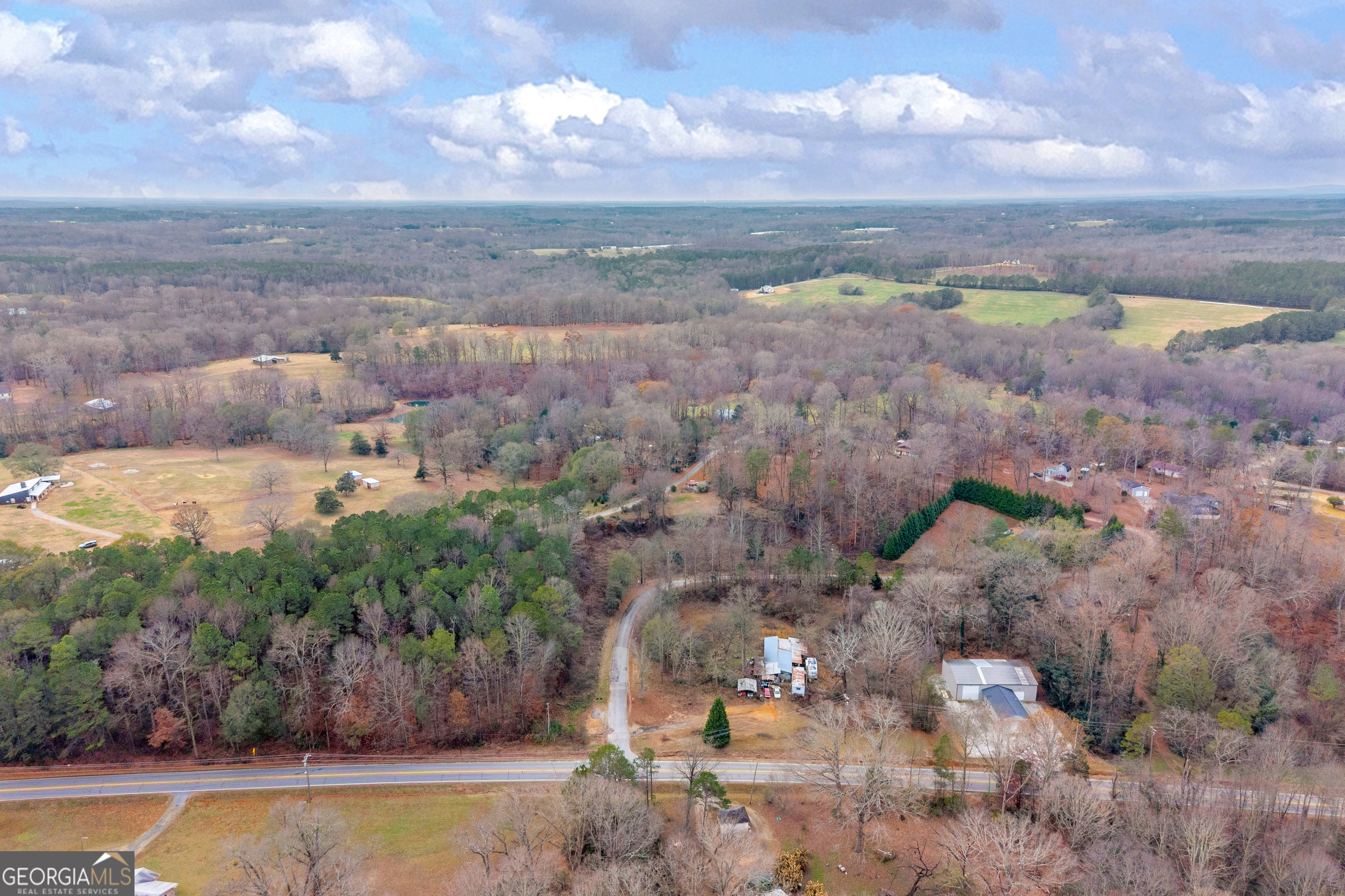 510 Gumlog Grove Road Lavonia, GA 30553 - Photo 19 of 22 a view of a lake with green space