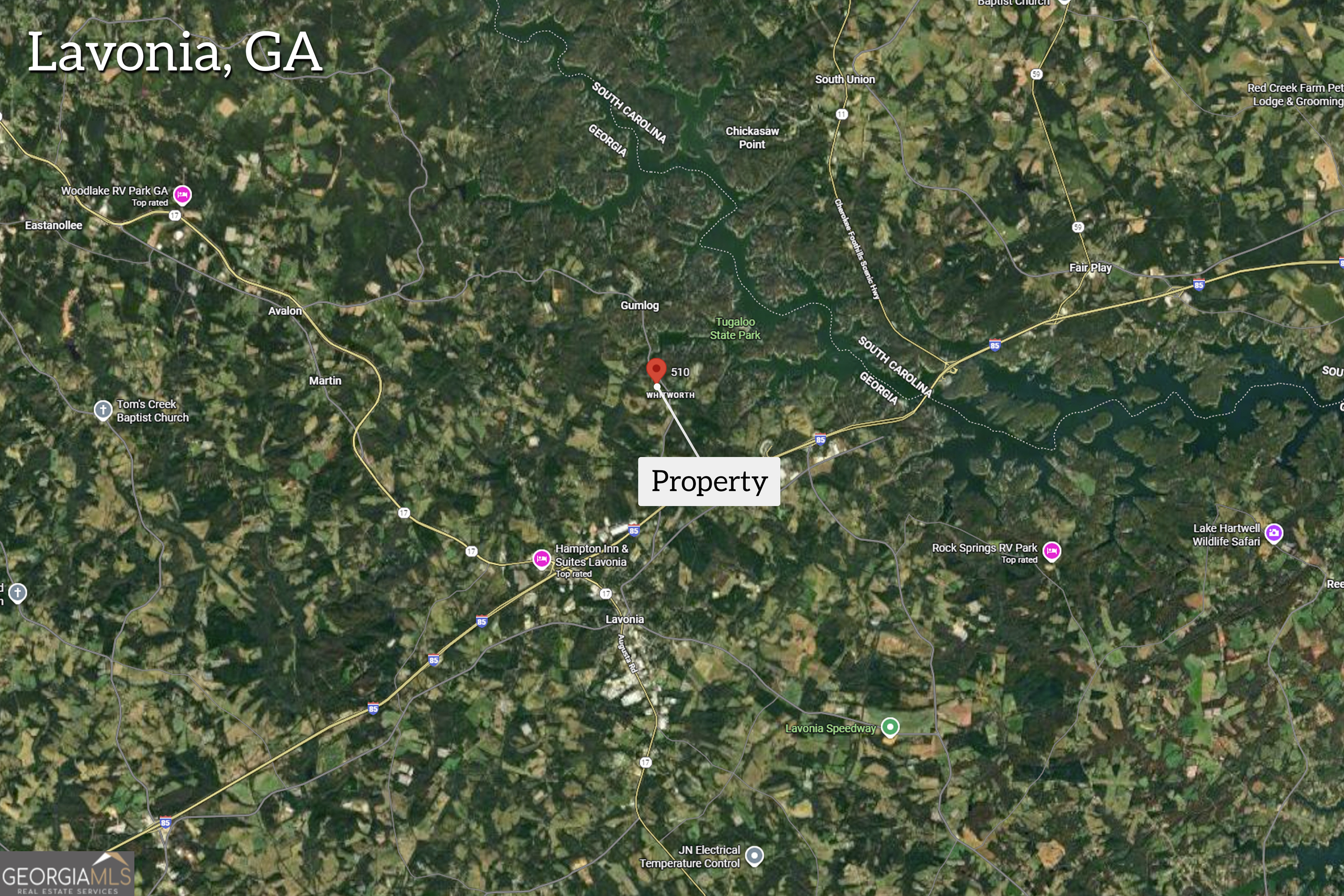 510 Gumlog Grove Road Lavonia, GA 30553 - Photo 22 of 22 a sign that is sitting in a tree