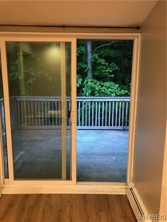 11401 Partridge Road Holland, NY 14080 - Photo 18 of 26 Upper sliding glass doors to deck overlooking tree