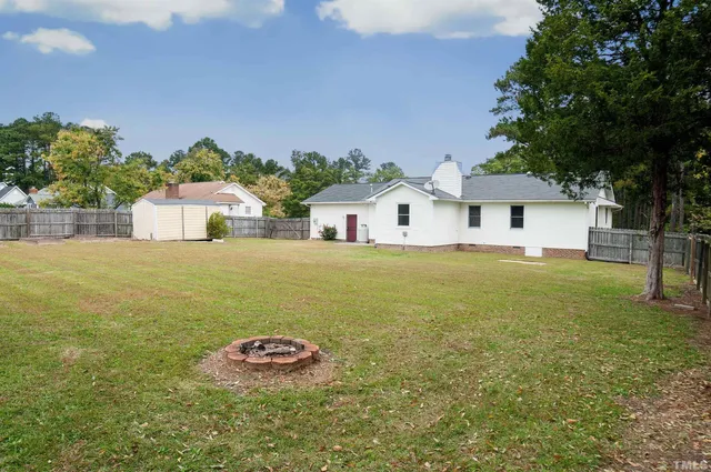 a view of a house with a garage and a garage