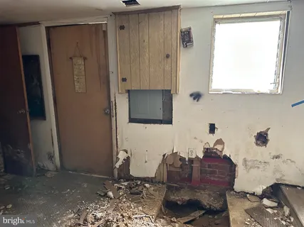 a view of a balcony with wooden floor