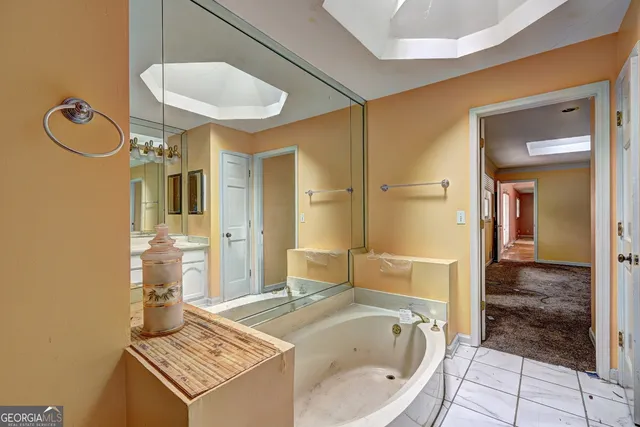 a bathroom with a shower and a sink